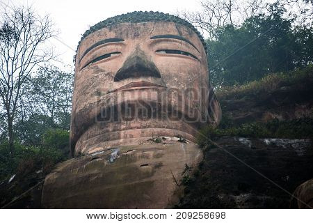 View of the Buddha statue in Leshan, China. Leshan Buddha is the world's largest statue of Buddha, whose height is 71 meters.