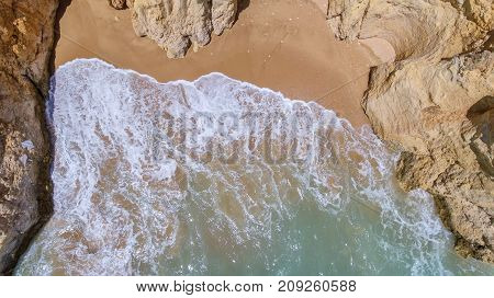 Aerial. Rocks and beaches near the beaches of Portimao.