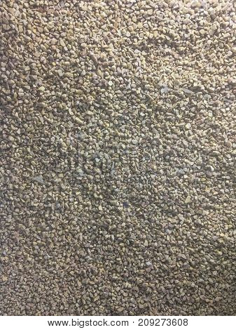grain stone for background and texture. It's rough and not clear. founed be in natural . sometimes used to decorate in the garden and the walkway in the park. It's brown colow and diferent tone color.