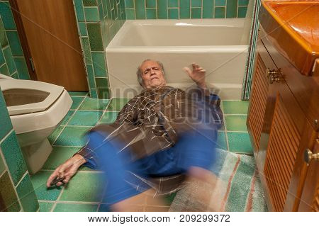 A senior man fell on a bathroom floor and is calling for help with his beeper