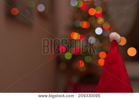 Santa Claus hat with blurry background and lights
