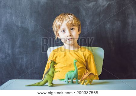 Boy Showing A Dinosaur As A Paleontologist