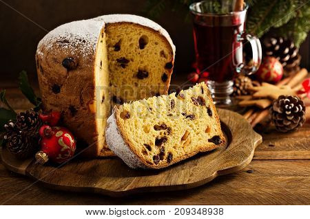 Traditional Christmas panettone with raisins and dried fruits