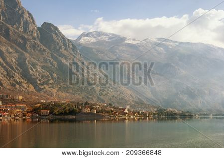 Seaside village of Dobrota with Mount Lovchen in the background. Bay of Kotor (Adriatic Sea), Montenegro, winter