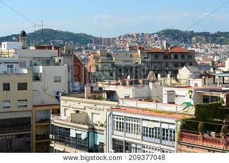 Barcelona historical buildings in Eixample District from the top of Casa  in Eixample District of Barcelona, Catalonia, Spain.