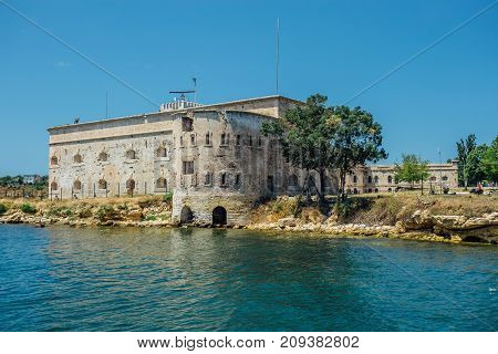 Old damaged by war fort in the Black Sea coast. Coastal Michael's fortress in Sevastopol, Crimea