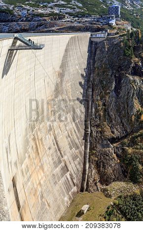 Observation platform on the wall of the Koelnbrein Dam and the Malta mountain hotel in the Hohe Tauern range within federal state of Carinthia, Austria.