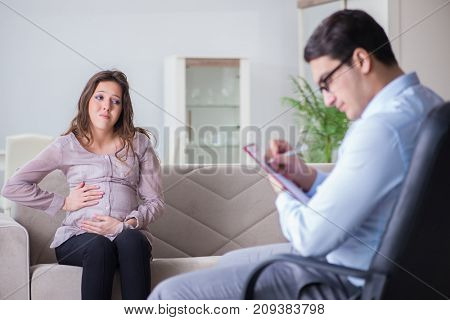 Pregnant woman visiting psychologist doctor