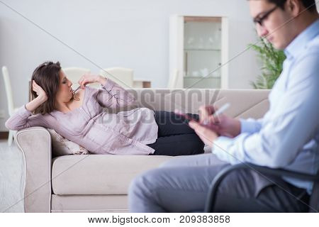Pregnant woman visiting psychologist doctor