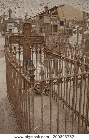 Pisagua, Tarapaca Region, Chile - August 30, 2017: Historic cemetery from the era of nitrate mining in the Atacama Desert, at Pisagua on the coast of northern Chile