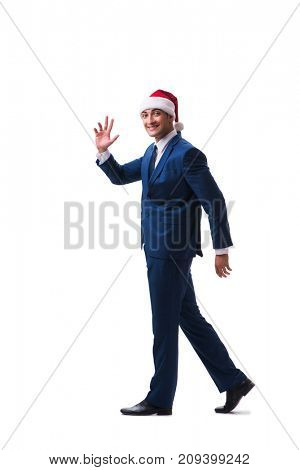 Young busnessman wearing santa hat in christmas concept on white