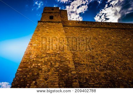 Hammamet, Tunisia. Image of architecture of old medina with dramatic sky at sunset time.