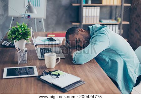 Sweet Dreams In The Work Station. Sleepy Tired Freelancer Is Snoozing At His Work Place, Coffee Cup