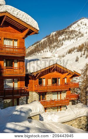 Alpine winter mountain landscape. French Alps covered with snow in sunny day. Val-d'Isere, France