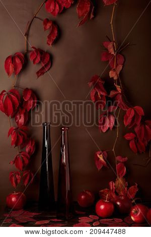 Autumn monochrome still-life in red and burgundy shades. Selective focus.