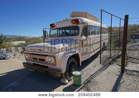 December 14 2015 Terlingua Texas: abandoned bus in Terlingua ghost town mostly a tourist destination for park visitors from Big Bend National Park