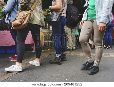 People queuing up for a food truck