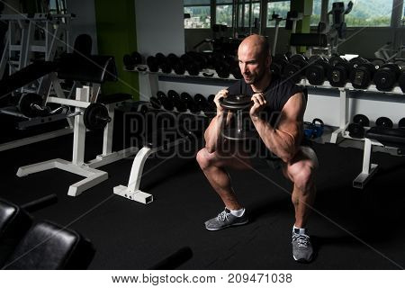Quadriceps And Glutes Exercise In A Gym