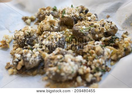 stuffed cultivated mushrooms and gratineed in oven