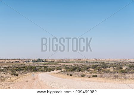 A farm landscape next to the dry Auob River on the C15-road between Stampriet and Gochas in the Hardap Region in Namibia