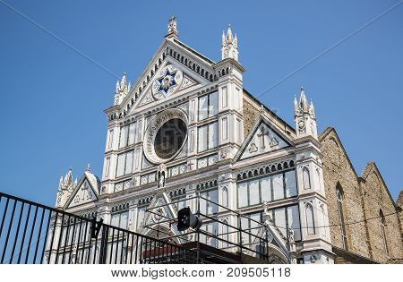 The Basilica di Santa Croce (Basilica of the Holy Cross) on square of the same name in Florence Tuscany Italy. Florence is a popular tourist destination of Europe.