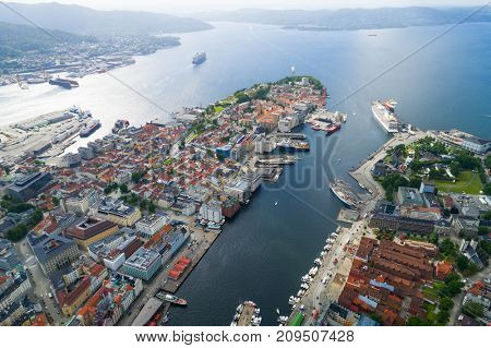 Bergen is a city and municipality in Hordaland on the west coast of Norway. Bergen is the second-largest city in Norway. The view from the height of bird flight. Aerial FPV drone photography.