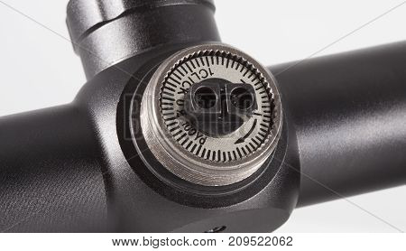 Knob used to adjust windage on a rifle scope