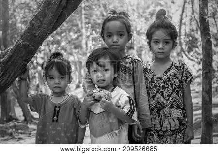 SIEM REAP CAMBODIA - MAY 2 : Unidentified childrens of Cambodian in the forest at kabal spean on May 2 2015 in Siem Reap Cambodia