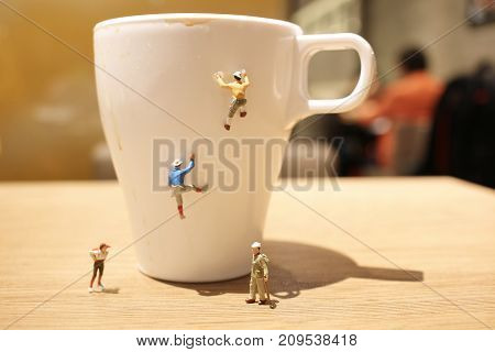 Fun Of Mini Tiny  People Climbing The Mug