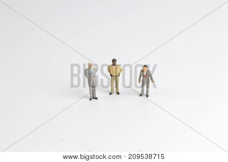 Mini Model Group Of Investor Standing Together