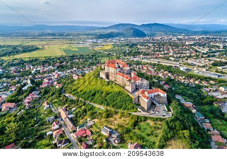 Aerial view of Mukachevo with the Palanok Castle in Zakarpattia, Ukraine