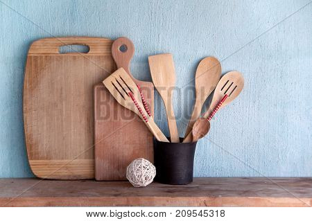 Kitchen Items On A Shelf Near The Wall