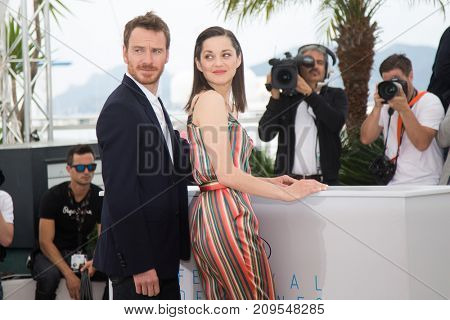 CANNES, FRANCE - MAY 23, 2015: Marion Cotillard, Michael Fassbender attend the 'Macbeth' Photocall . 68th annual Cannes Film Festival at the Palais des Festivals 