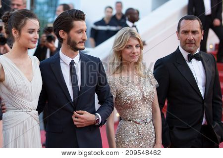 CANNES, FRANCE - MAY 21, 2015: Melanie Laurent, Gilles Lellouche, Charlotte Le Bon, Pierre Niney  attend the 'Inside Out' premiere. 68th annual Cannes Film Festival at the Palais des Festivals 