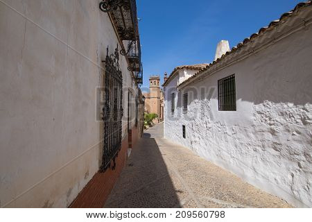 Street In Old Town Of Banos De La Encina And Belfry