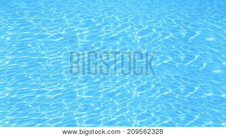 abstraction background sun rays at the bottom of the pool under water