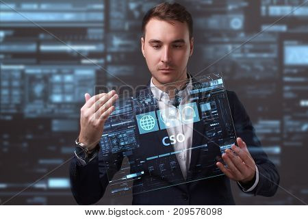 Business, Technology, Internet And Network Concept. Young Businessman Working On A Virtual Screen Of