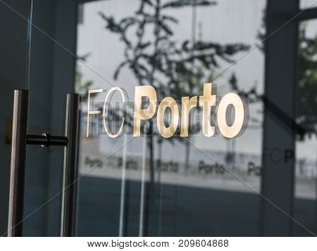 Oporto, Portugal - july 2016: Entrance of Porto Football Club Main Offices at Do Dragao Stadium: Glass Doors