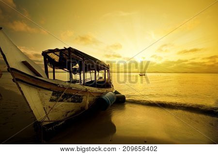Fishing boat in sunset at Kapas Island, Terengganu, Malaysia