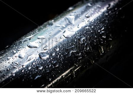 Water droplets on a stainless steel surface