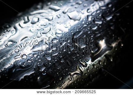 Water droplets on a stainless steel surface