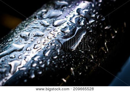 Water droplets on a stainless steel surface