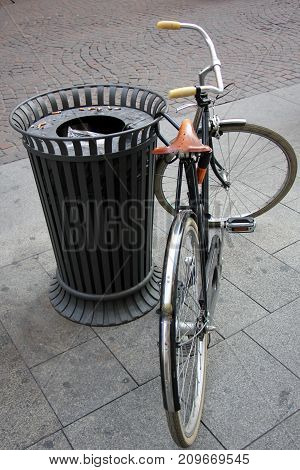 A bicycle is a wheeled vehicle driven by the muscular force of a person through the foot pedals