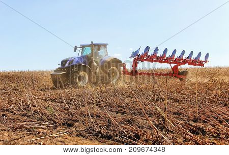 Work Of A Powerful Tractor In Field Cultivation And Cultivation. Agronomy