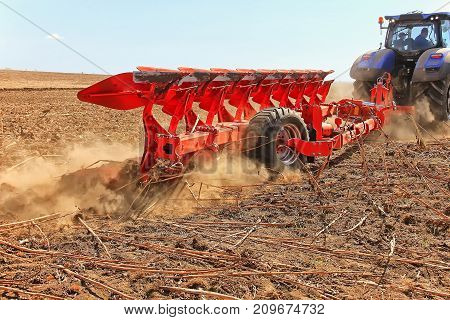 Work Of A Powerful Tractor In Field Cultivation And Cultivation. Agronomy