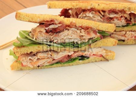 Fresh chicken meat sandwich: charcuterie lettuce pickles and mayonaisse