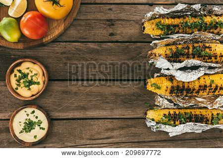 Grilled Corn On Wooden Table
