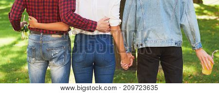 Friendship love jealousy adultery polygamy concept. Love triangle. Young woman in relationship with two men.