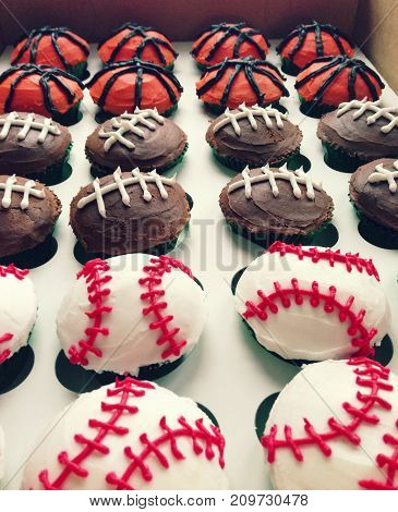 a sports themed birthday cupcakes with nobody.