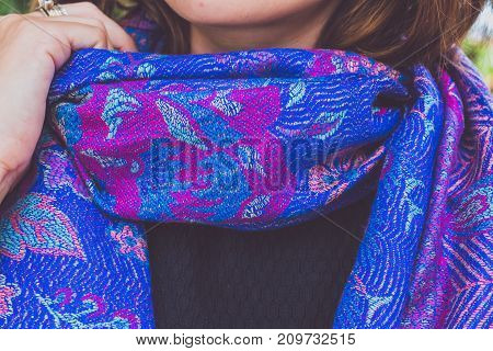 Yong woman hands with cashmere scarf. Bali island. Fashion shot.